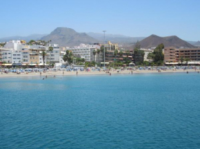 Beachfront Apartment Cristimar with pool, wifi, roofed balcony